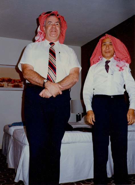 Oral Miller tries on a Saudi Arabian headscarf, along with another delegate to the joint meetings of the World Council for the Welfare of the Blind and the International Federation of the Blind. At this 1984 meeting, the groups merged to become the World Blind Union. Miller headed the resolutions committee.