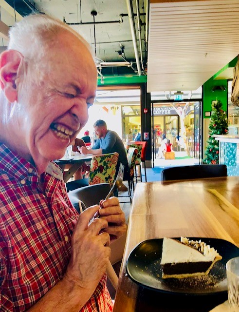 Don Thomson in a restaurant enjoying a slice of pie