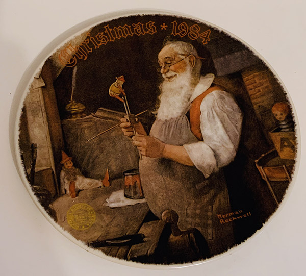Plate with painted image of Santa in his workshop