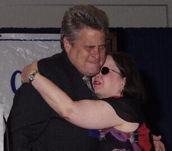 Edwards and Gayle Krause exchange a hug following Paul's final convention
speech as president of ACB.