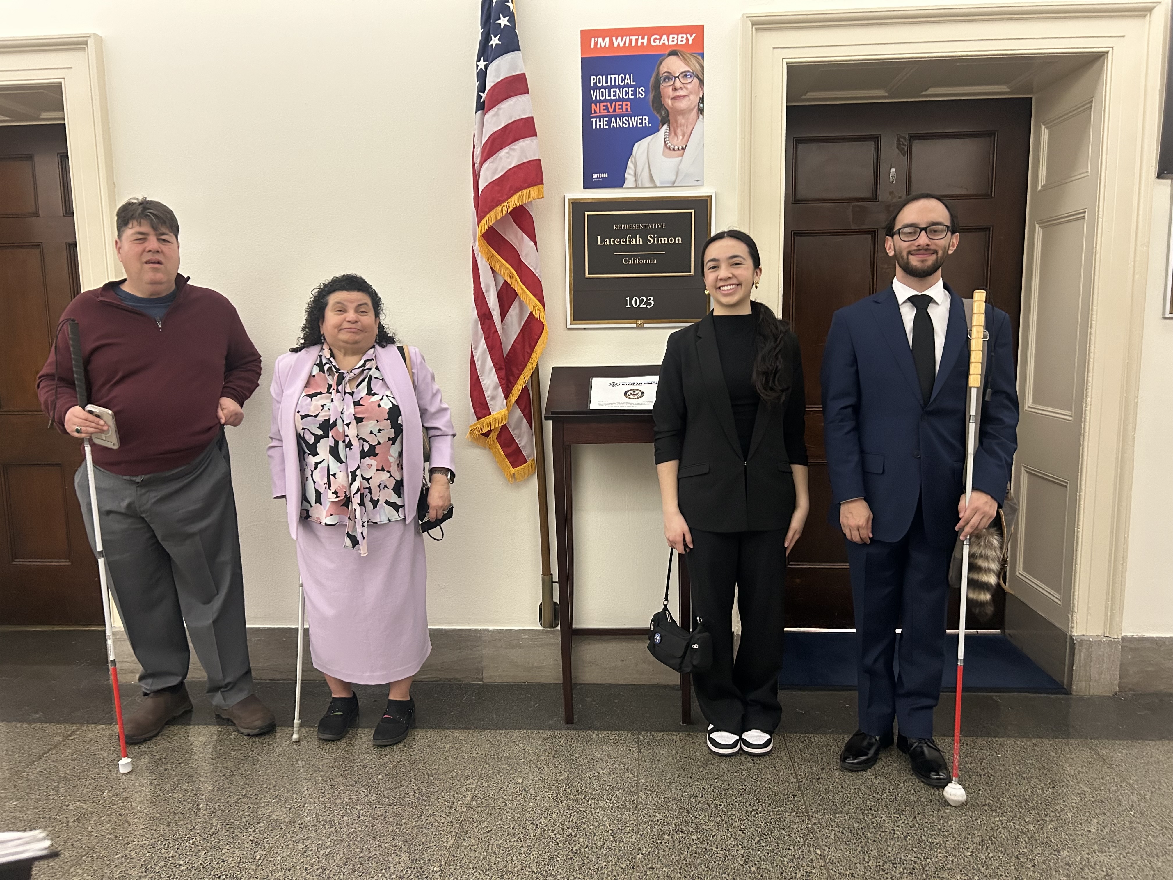 A group picture of advocates from ACB's Texas state affiliate alongside ACB's advocacy fellow right outside Representative Lateefah Simon’s office on Hill Day during the 2026 D.C. Leadership Conference.