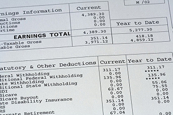 Closeup of payroll stub