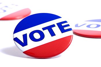 Red, white and blue VOTE button